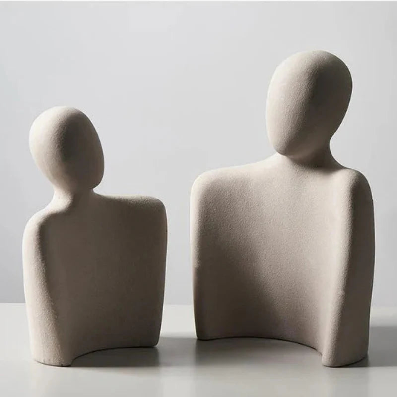 Moderne abstrakt skulptur, der symboliserer forbindelse og ømhed dekoration