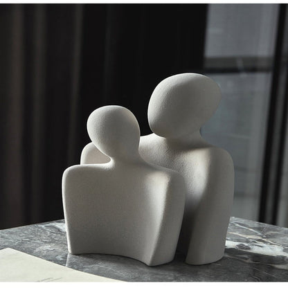Moderne abstrakt skulptur, der symboliserer forbindelse og ømhed dekoration