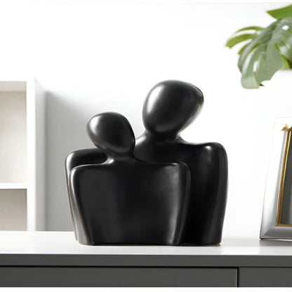 Moderne abstrakt skulptur, der symboliserer forbindelse og ømhed dekoration