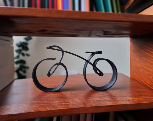 Minimalistisk trådrammescykelskulptur dekoration