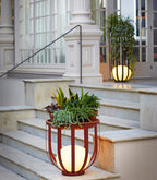 Stilfuld have lampe med integreret blomsterkasse